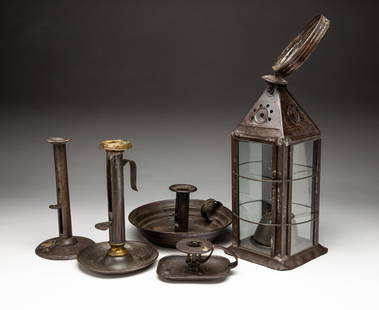 FIVE AMERICAN TIN LIGHTING ARTICLES, INCL. GLASS-PANELED LANTERN.: American, 19th Century. A lantern, four glass panels, wire cage, pyramid perforated top, ring handle and fluid burner, 12"h. plus handle. Hog scraper candlestick with pushup, 7.25"h. A pushup stick