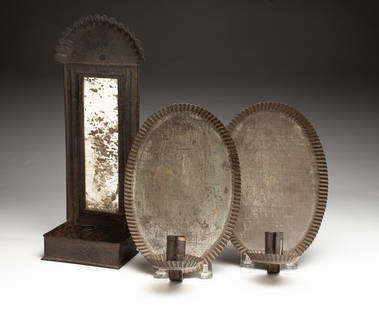 THREE AMERICAN TIN HANGING LIGHTING DEVICES, INCL. PAIR OF CRIMPED OVAL SCONCES.: American, 19th Century. A pair of oval hanging wall sconces with crimped edges, 9"h. Together with a mirrored wall sconce with scalloped top edge, 13"h.