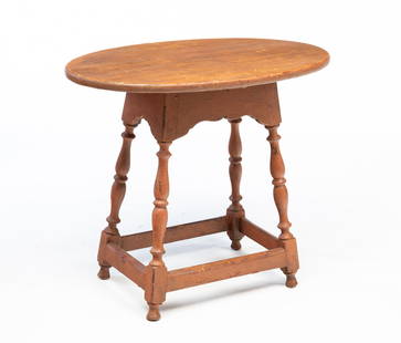 AMERICAN WILLIAM AND MARY SALMON-PAINTED PINE TAVERN TABLE.: American (Connecticut), 18th Century. Pine. Oval top with rounded edge, base with nicely shaped apron, splayed turned legs, pegged and rosehead nail construction. Scrubbed top has various names and in