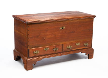 PENNSYLVANIA CHIPPENDALE WALNUT TWO-DRAWER BLANKET CHEST.: American (Pennsylvania), Late 18th Century. Walnut with poplar secondary. One board top with breadboard ends and applied edge moldings, dovetailed case and feet, two drawers to front, interior lidded
