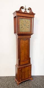L.C. MAISTER CARLON INLAID TALL CASE CLOCK.: England, circa 1800. Mahogany with pine secondary. Bonnet with broken arch pediment, brass rosettes and finial, fluted pilasters and line inlays. Case with moldings under bonnet and at waist, quarter