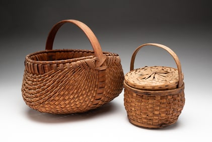 TWO AMERICAN SPLINT-WOVEN BASKETS WITH HANDLES.