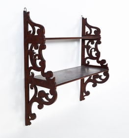 VICTORIAN WALNUT TWO-TIER WALL SHELF.
