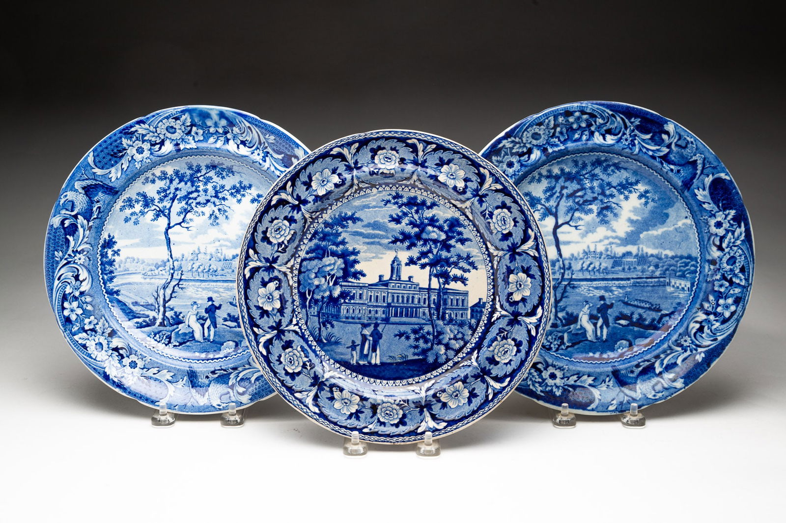 THREE HISTORICAL BLUE STAFFORDSHIRE PLATES WITH AMERICAN SCENES, INCL. J. & W. RIDGWAY. (1 of 6)