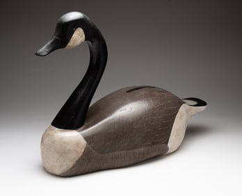 AMERICAN CARVED AND PAINTED CANADIAN GOOSE DECOY.