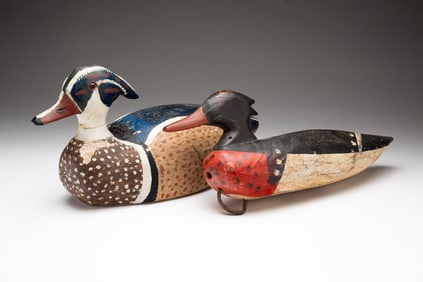 TWO AMERICAN CARVED AND PAINTED MERGANSER DUCK DECOYS.