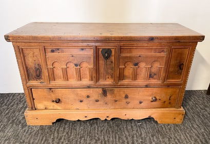 LARGE CARVED PINE BLANKET CHEST WITH DRAWER.