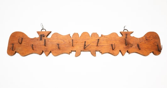 EUROPEAN IRON-MOUNTED PINE HANGING GAME RACK.