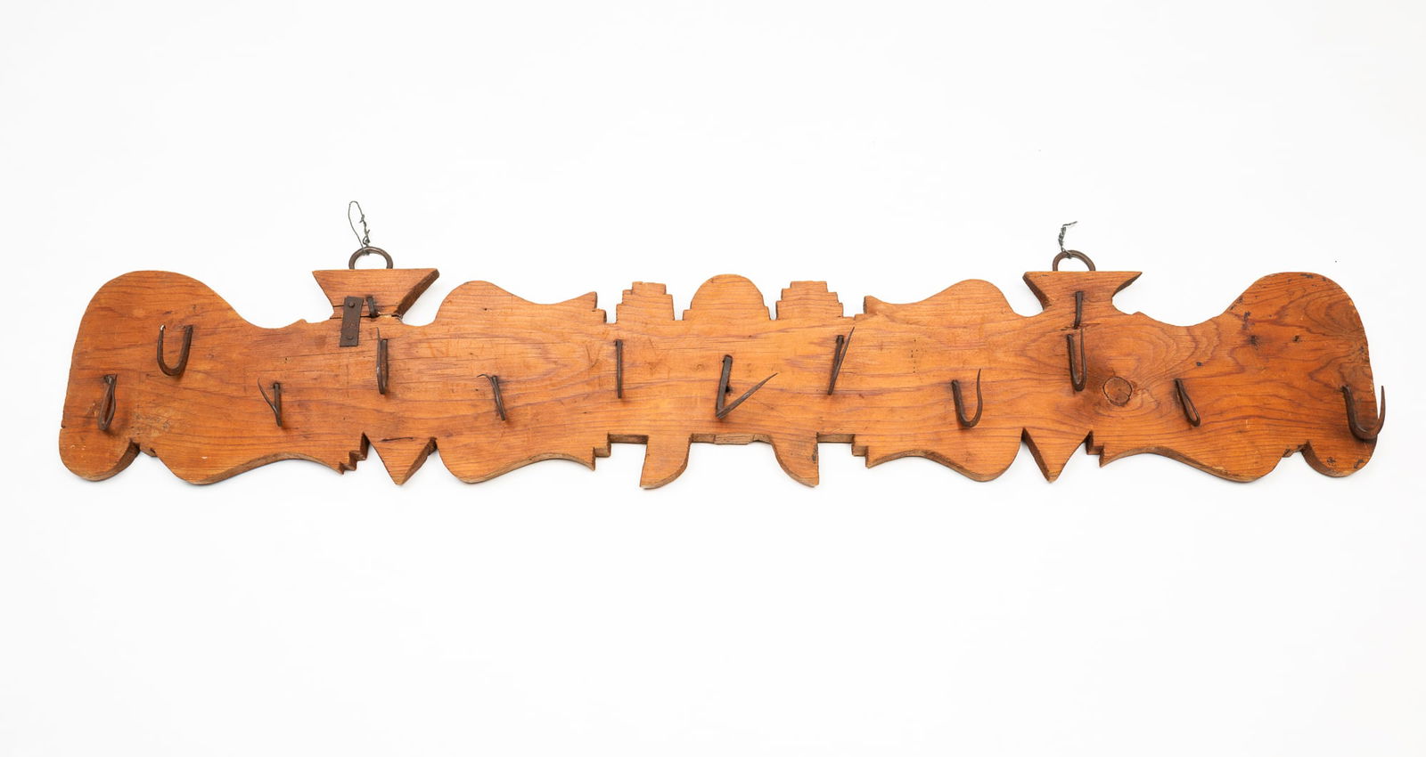 EUROPEAN IRON-MOUNTED PINE HANGING GAME RACK. (1 of 3)