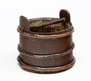AMERICAN PAINTED AND STAVED PINE BUCKET WITH GRAPEVINE HOOPS.