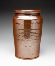 AMERICAN GLAZED AND TOOLED STONEWARE TOBACCO JAR.