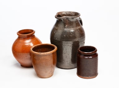 FOUR AMERICAN REDWARE VESSELS, INCL. PITCHER WITH TOOLED SHOULDER.