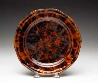 REDWARE PLATE WITH ROCKINGHAM GLAZE.