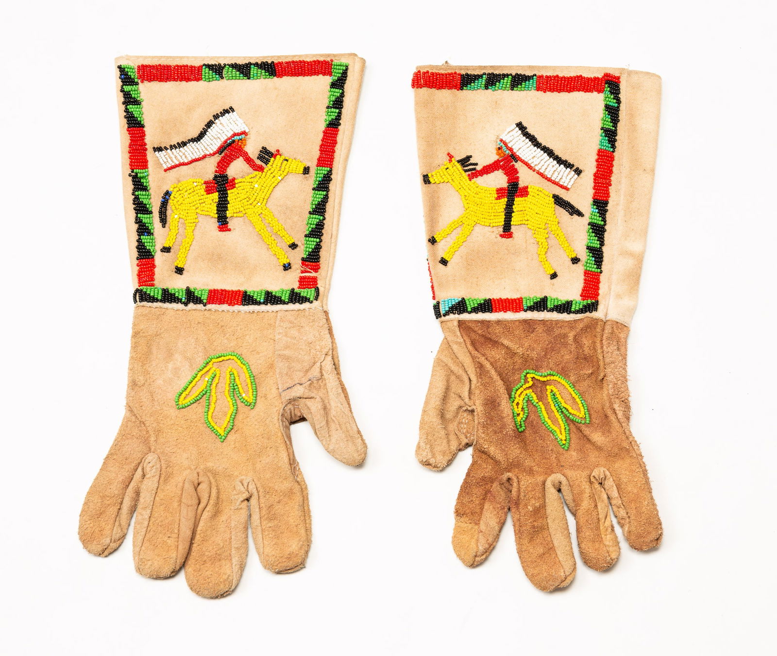NATIVE AMERICAN BEADED LEATHER GAUNTLET GLOVES. (1 of 4)