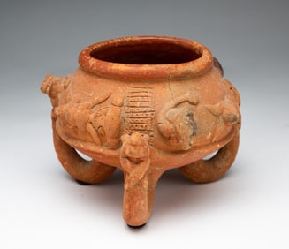 EARTHENWARE LOOPED LEG TRIPOD VESSEL.