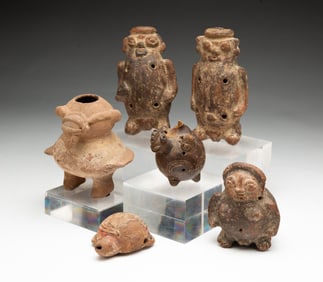 SIX EARTHENWARE WHISTLES AND A DIMINUTIVE FIGURE.
