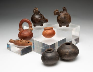 SEVEN DIMINUTIVE EARTHENWARE JARS AND WHISTLES.