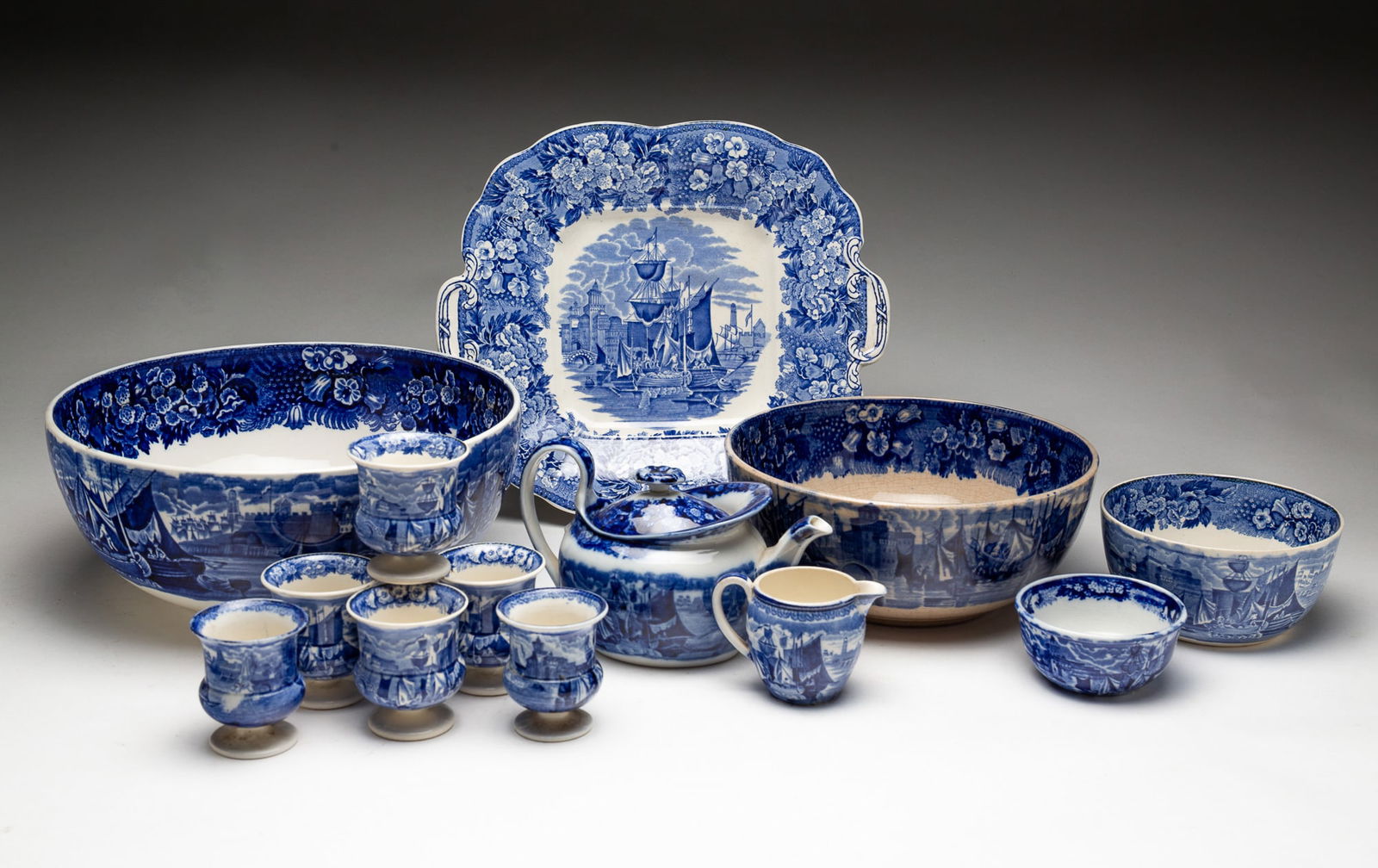 COLLECTION OF WEDGWOOD "FERRARA" BLUE AND WHITE TRANSFERWARE CHINA. (1 of 8)