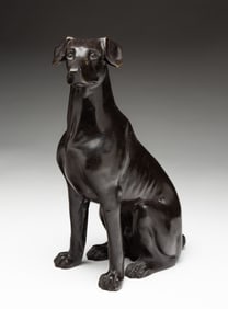 SITTING DOG BRONZE STATUE.