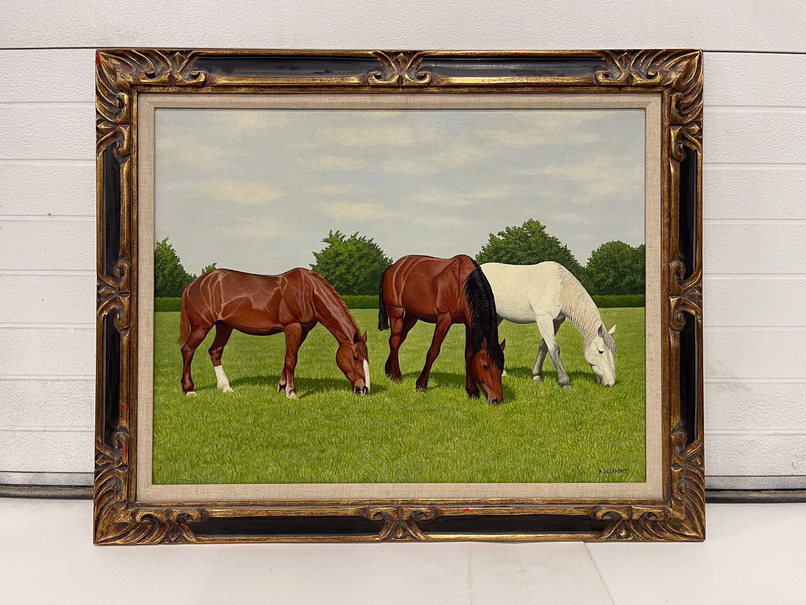 ROGER DELAPORTE (FRENCH, 1907-1969) "TROIS CHEVAUX" OIL ON CANVAS.: Roger Delaporte (French, 1907-1969). Oil on canvas. Depicting three horses grazing in a pasture. Signed at lower right. Ex Berri Lardy et Cie (Paris). Canvas, 19.75"h. 25.5"w. In a carved gilt wood fr