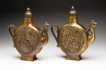 PAIR OF ORNATE CHINESE BRONZE POTS.