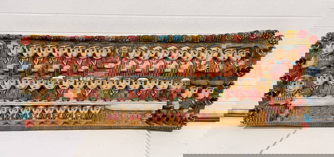 ANTONI KAMINSKI (POLAND, B. 1947) "WEDDING FEAST" CARVED AND POLYCHROMED WOOD FOLK ART SCULPTURE,: Poland, dated 1994. Carved and polychromed wood. Large folk art wall hanging depicting a group of figures in three lines, sitting at tables, the bride and groom in the center. Titled, signed, and date