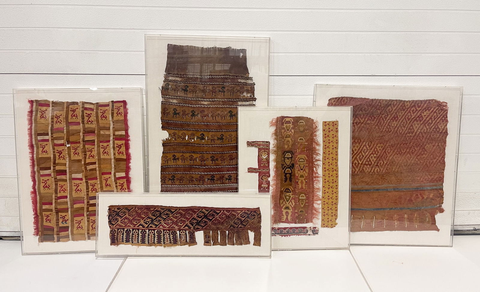 FIVE FRAMED TEXTILE FRAGMENTS. (1 of 10)