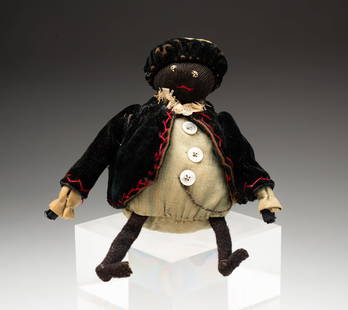 FOLKSY BLACK AMERICANA CLOTH DOLL.: American, 19th Century. Black doll with round body and wearing a denim shirt, velvet coat and beret, 5"h. Ex Nathan Liverant.