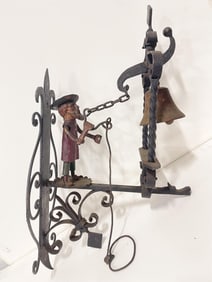 WROUGHT IRON POLYCHROME PAINTED FIGURAL DOOR BELL.
