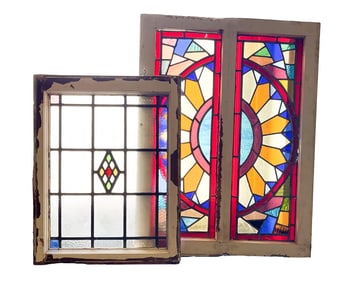 TWO AMERICAN STAINED AND LEADED GLASS ARCHITECTURAL WINDOW PANELS.