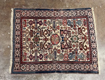 CAUCASIAN WOOL AREA RUG.