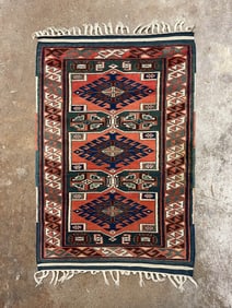 CAUCASIAN WOOL AREA RUG.