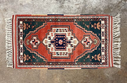 CAUCASIAN WOOL AREA RUG.