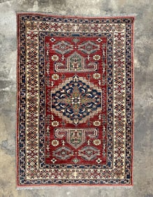 CAUCASIAN WOOL AREA RUG.