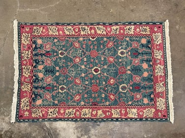 ORIENTAL WOOL AREA RUG.