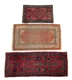 THREE ORIENTAL WOOL AREA RUGS.