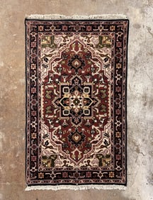 HERIZ WOOL AREA RUG.