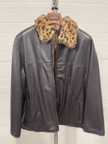 CUSTOM LEATHER BOMBER JACKET WITH FUR LINING.
