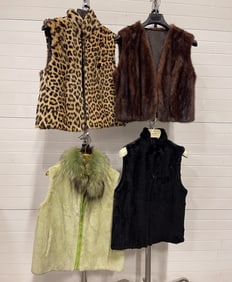 FOUR FASHION VESTS.