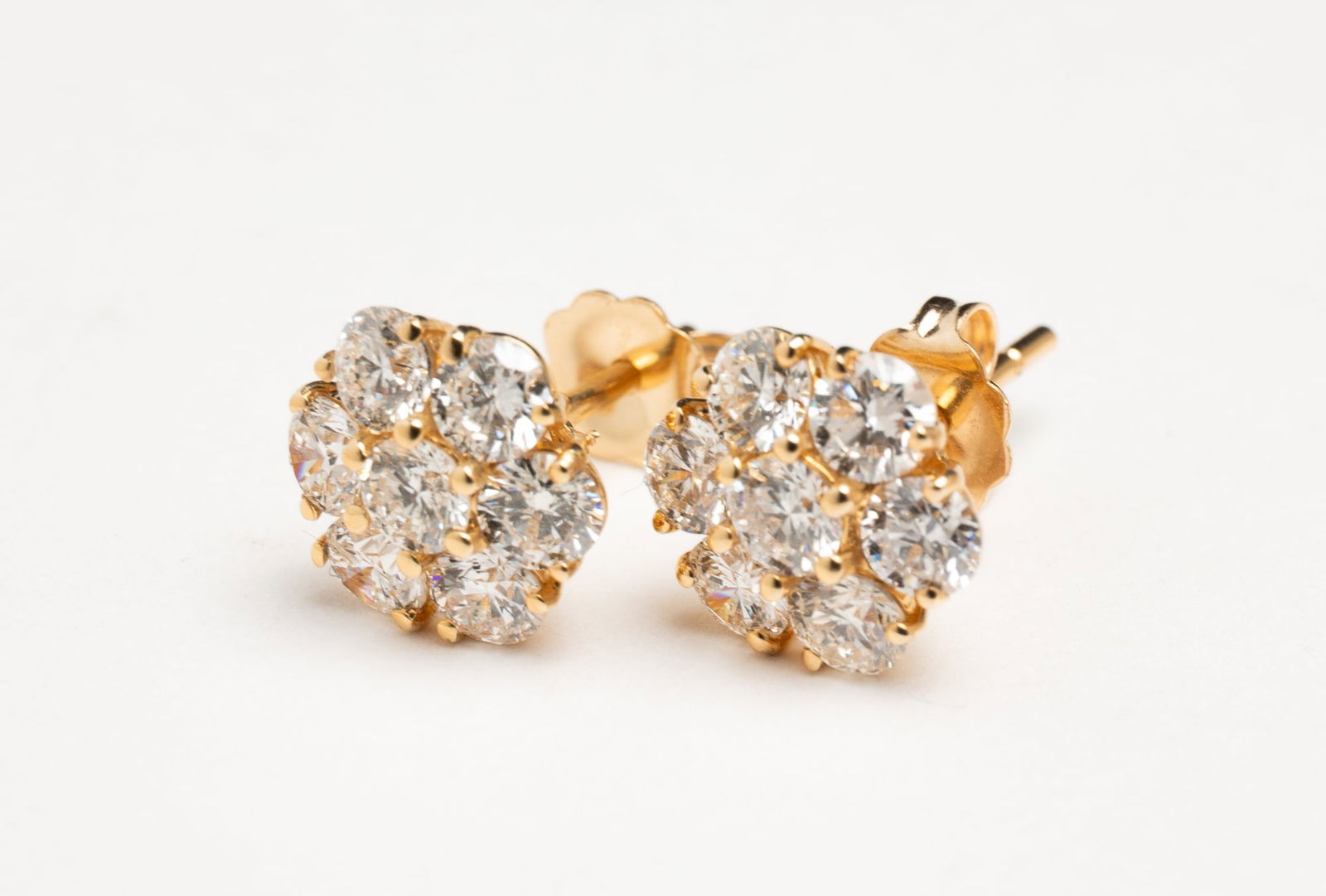 YELLOW GOLD DIAMOND CLUSTER STUD EARRINGS. (1 of 2)