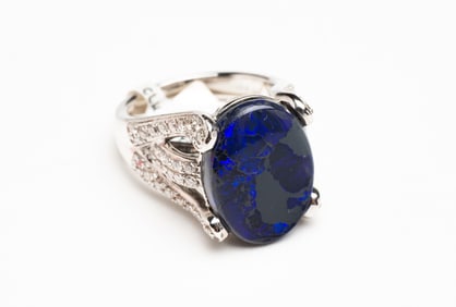 DEEP BLUE OPAL AND DIAMOND RING.