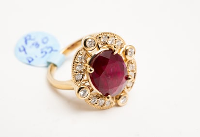 14 KARAT RUBY AND DIAMOND RING.