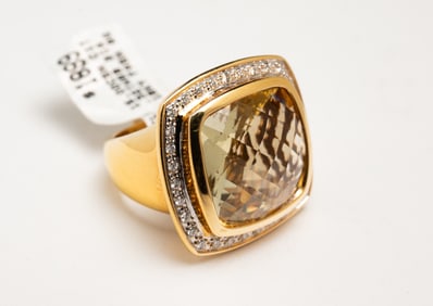 LADIES 18K CITRINE AND DIAMOND RING.