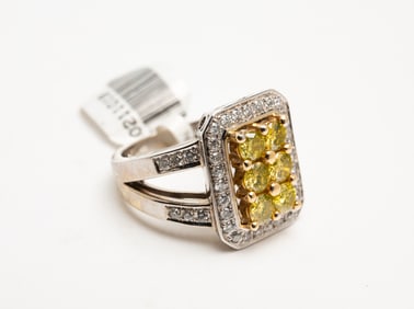 14K WHITE AND YELLOW DIAMOND HALO RING.