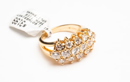 14K THREE-ROW TIERED DIAMOND RING.