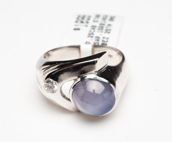 RETRO STYLE WHITE GOLD STAR SAPPHIRE AND DIAMOND RING.