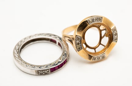 TWO 14K GOLD AND GEMSTONE RINGS.