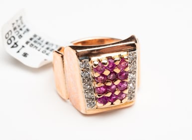 ART DECO STYLE ROSE GOLD RUBY AND DIAMOND CLUSTER RING.