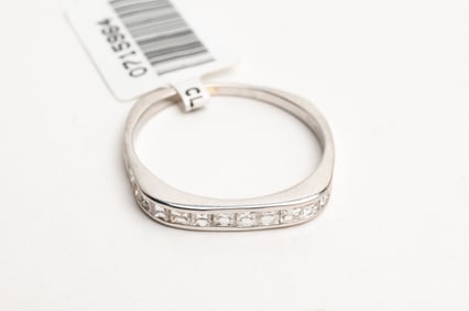 14K WHITE GOLD PRINCESS CUT DIAMOND BAND.