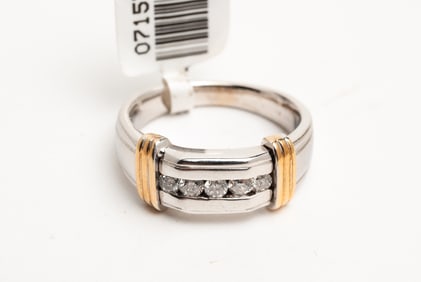 FIVE- STONE CHANNEL SET DIAMOND BAND.